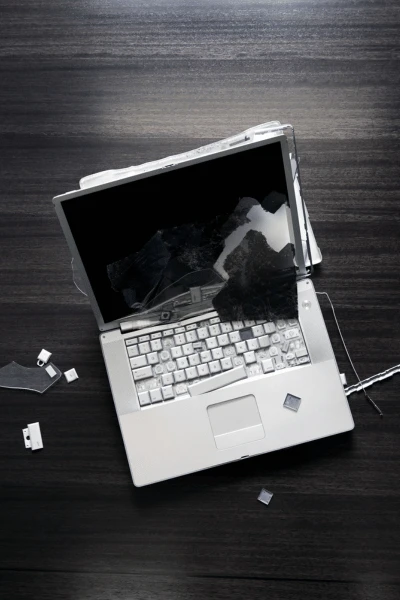 A broken laptop screen and keyboard