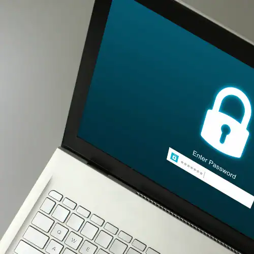 An open laptop with a password login screen
